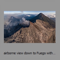 airborne view down to Fuego with Acatenango behind